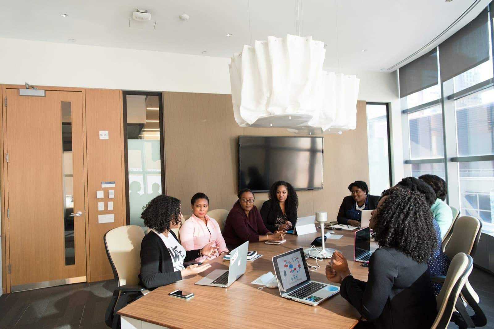 Enterprise leaders reviewing program performance